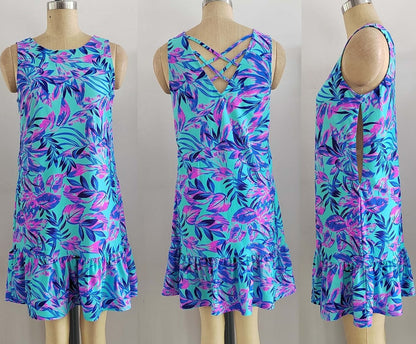 Summer Beach Dress on a mannequin, showcasing its seamless swimsuit fabric and vibrant floral pattern, ideal for versatile, comfortable, and stylish wear.